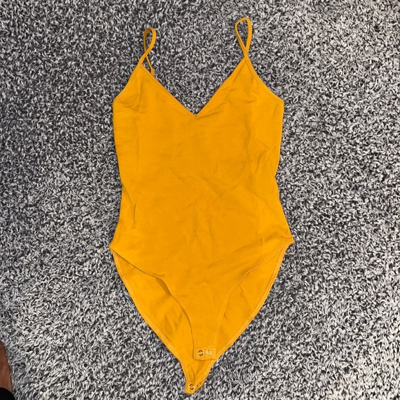Yellow V Neck Bodysuit - Picture 1 of 3